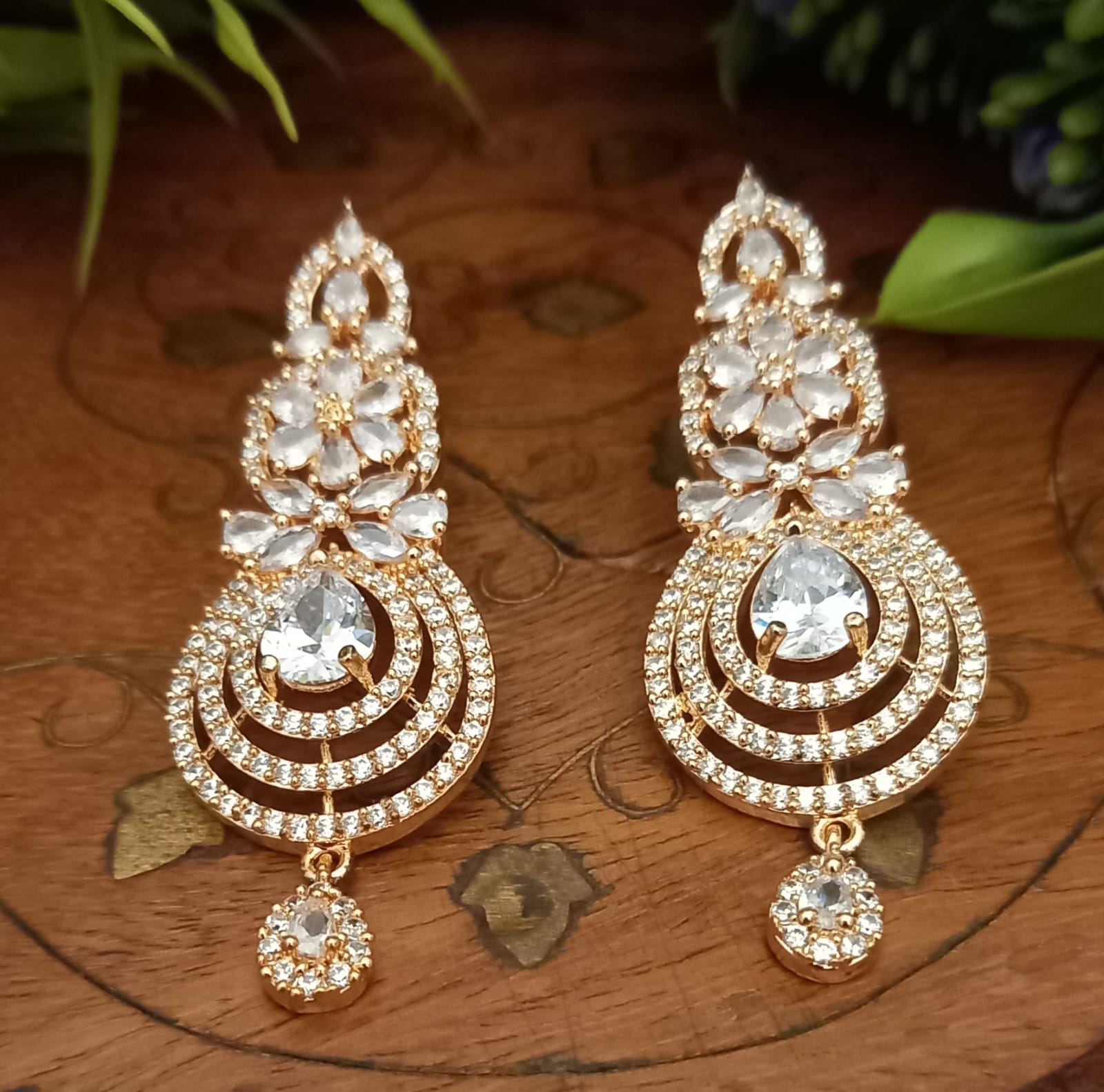 American Diamond Gold Plated Long AD Emerald Green Jhumka | South Indi –  Indian Designs